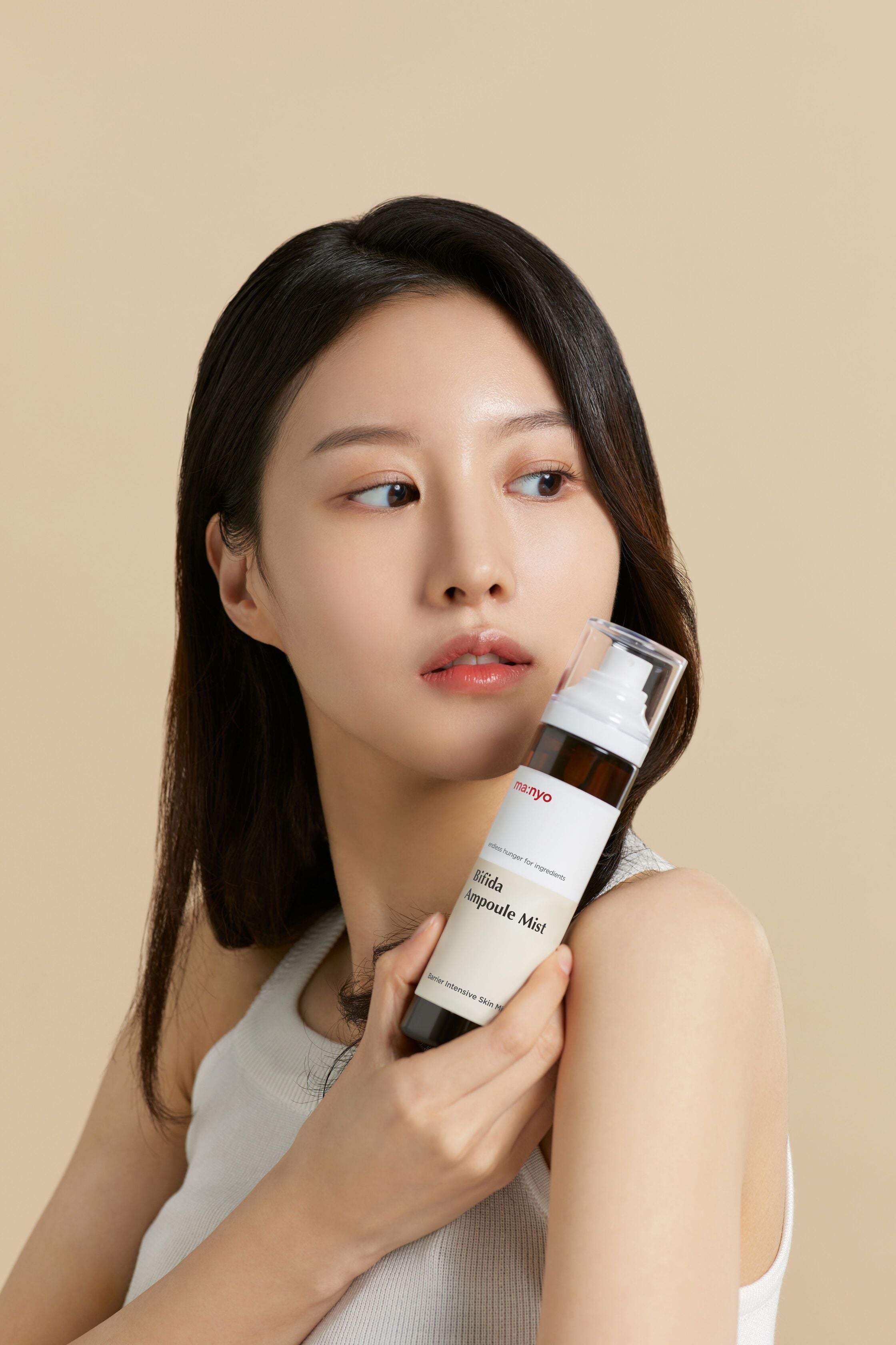 Model holding Bifida Ampoule Mist